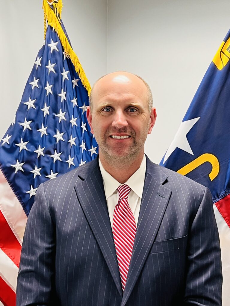 Photo of Commissioner Justin Edwards.