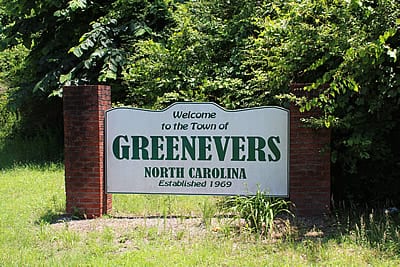 Photo of the Greenevers town sign.