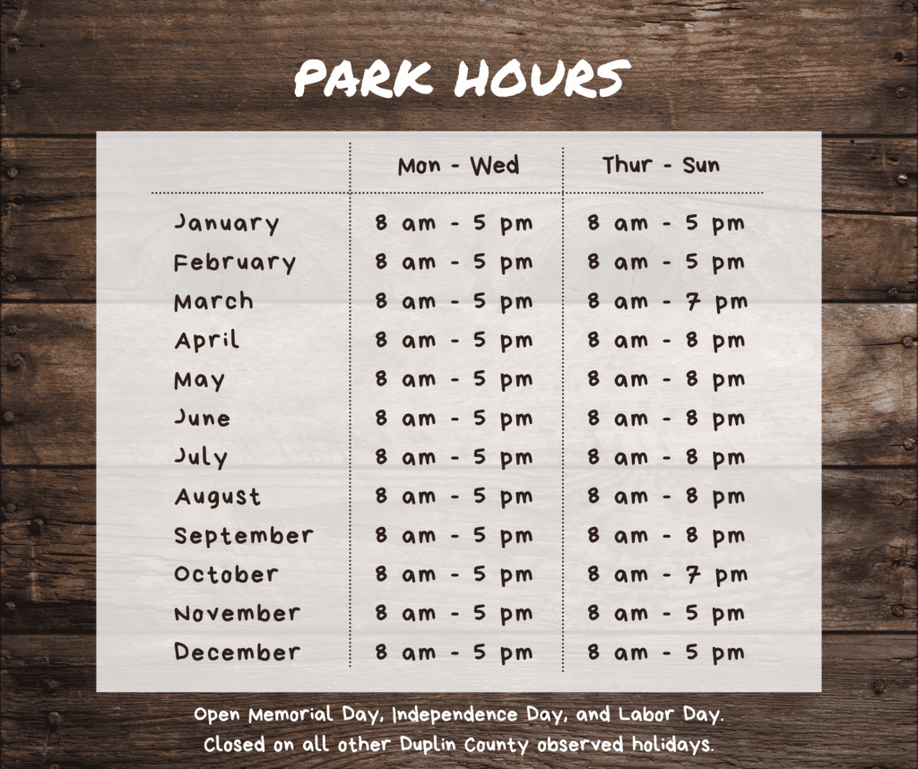 Photo of Cabin Lake's Park hours.