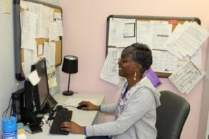 Photo of former employee Esther Roberts at the County Health Department.